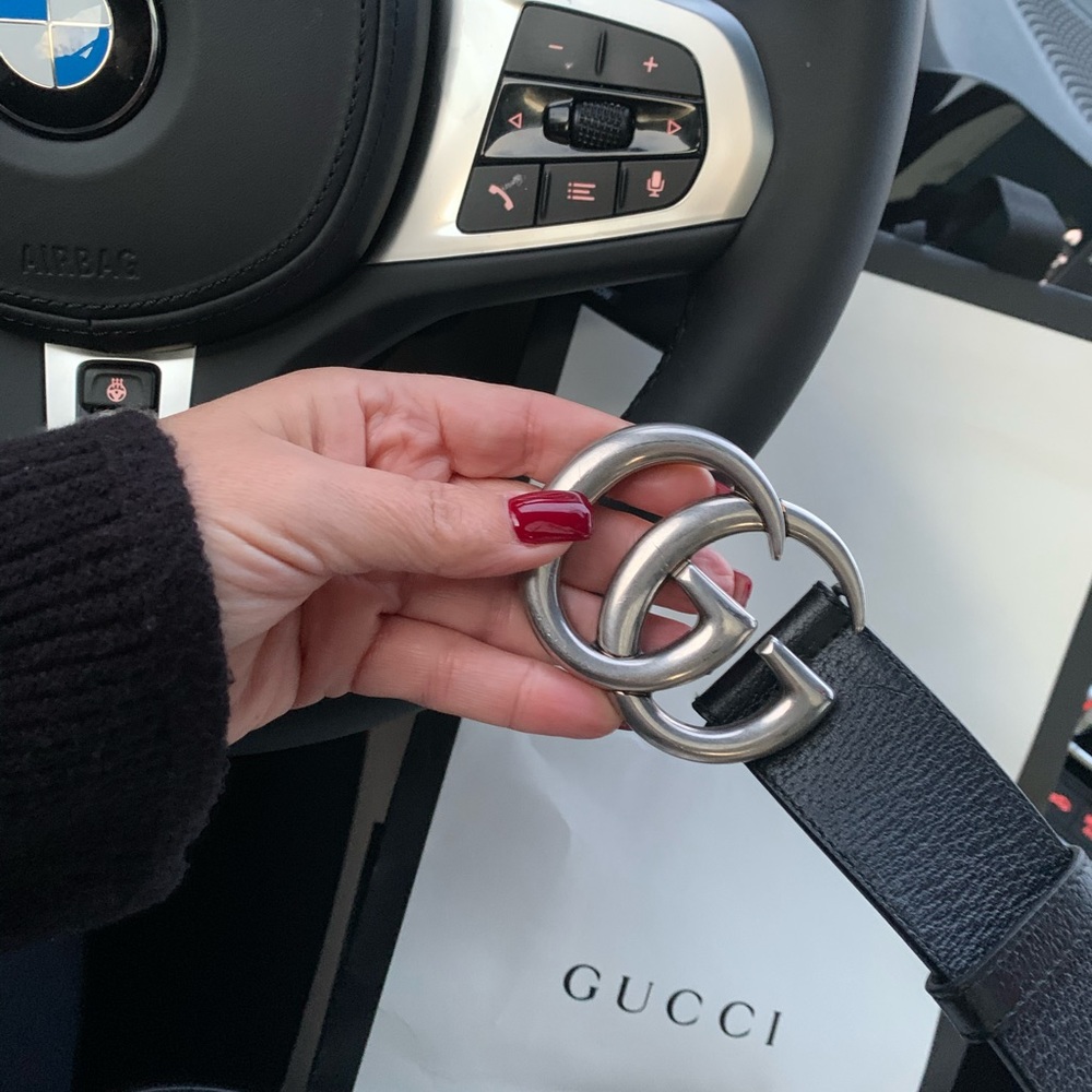 Gucci belt like new. Black and silver